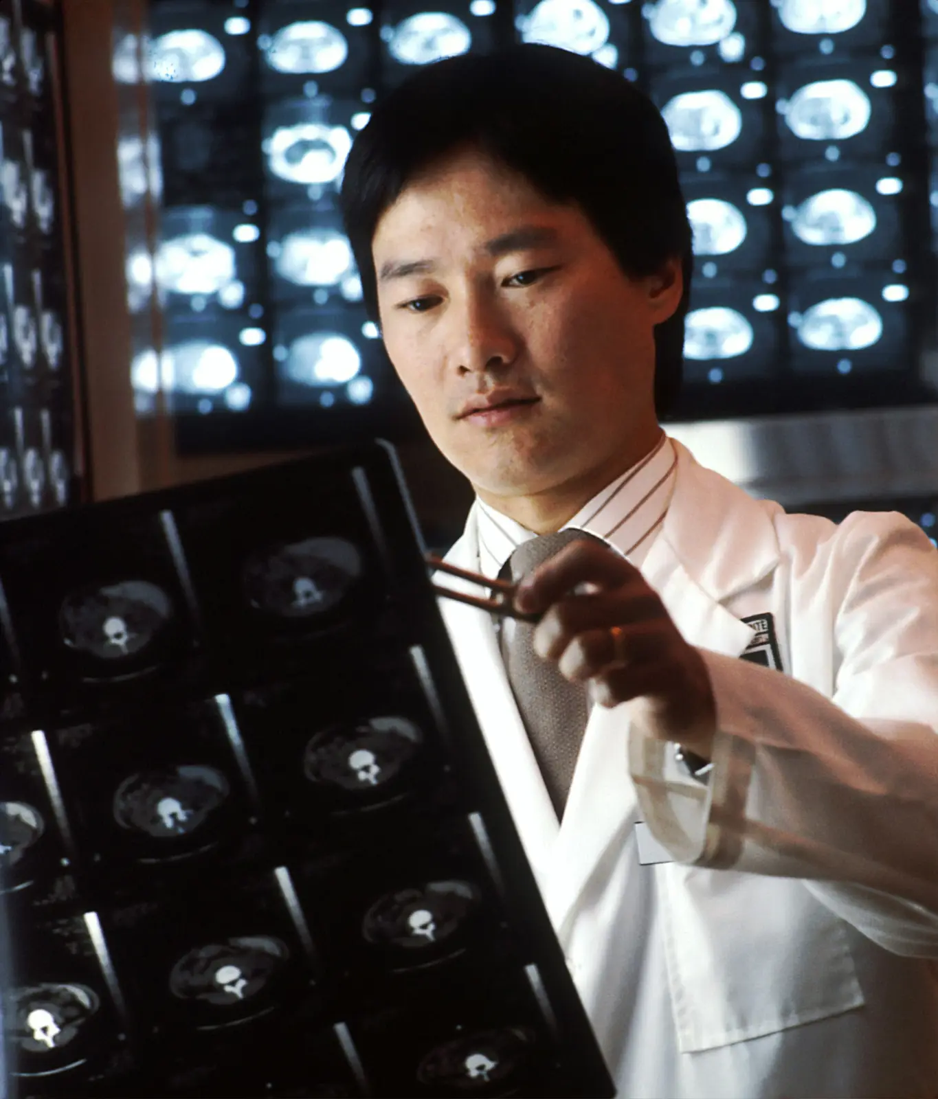 Doctor reviewing medical scans